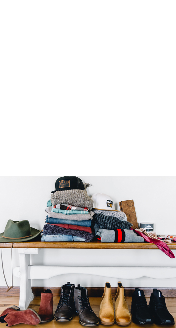 Stack of Men's and Women's Buckle clothing and accessories